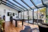 Véranda extension en aluminium noir style verrière pour salle de jeu et loisir